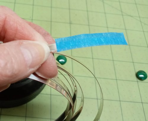 Judy Larson's Basic Bezel Wire Tutorial - , Metalwork, Butane Torch, Soldering, Solder, Cut the tape several millimeters too long